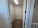 Walk-in pantry with wire shelving and under stair storage at 931 Signet Dr, Apollo Beach, FL 33572
