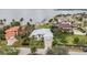 An aerial view of the house close to the beach with plenty of palm trees at 103 Graham Se St, Port Charlotte, FL 33952