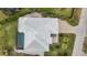 An aerial view of the house featuring a luxurious pool at 103 Graham Se St, Port Charlotte, FL 33952