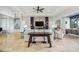 Bright and airy living room featuring tile floors and open floor plan with modern furnishings at 103 Graham Se St, Port Charlotte, FL 33952