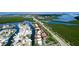 Picturesque waterfront properties with private docks, lush greenery, and convenient proximity to the water and recreational amenities at 10311 Waterbird Way, Bradenton, FL 34209