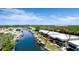 Waterfront condo boasts lush landscaping and a boat lift, perfectly situated near scenic waterways at 10311 Waterbird Way, Bradenton, FL 34209
