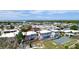 Aerial view showcases waterfront homes in a serene residential neighborhood at 10311 Waterbird Way, Bradenton, FL 34209