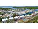 Waterfront community featuring residences, tennis courts, boat docks, and a community pool at 10311 Waterbird Way, Bradenton, FL 34209