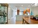 Open dining room with easy access to the kitchen, living area, and views to the entry way at 10311 Waterbird Way, Bradenton, FL 34209