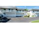 Charming townhouse complex with white balconies, stairs, and garages at 10311 Waterbird Way, Bradenton, FL 34209