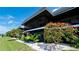 Elegant condominium features lush landscaping, enhancing its curb appeal and inviting ambiance at 10311 Waterbird Way, Bradenton, FL 34209