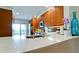 Modern kitchen featuring white marble countertop and stainless steel appliances at 10311 Waterbird Way, Bradenton, FL 34209
