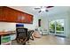 The office offers beautiful views of outdoor landscaping and a spiral staircase to the yard at 10311 Waterbird Way, Bradenton, FL 34209