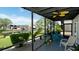 Relaxing screened lanai with water view and seating for enjoying the outdoors in comfort at 10311 Waterbird Way, Bradenton, FL 34209