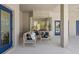 Comfortable lanai seating area with blue accents and an inviting view of the pool area at 18307 White Fang Ct, Parrish, FL 34219
