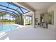 Expansive outdoor lanai with poolside seating, a view of the pool and backyard, and access to the house at 18307 White Fang Ct, Parrish, FL 34219