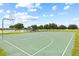 A vibrant playground with a basketball court and play structures, perfect for community fun and recreation at 18307 White Fang Ct, Parrish, FL 34219