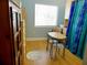 Guest bedroom with space for dining and a large closet at 1850 Sunny Dr # F4, Bradenton, FL 34207