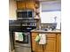 Functional kitchen with stainless steel appliances, granite countertops, and ample storage at 1850 Sunny Dr # F4, Bradenton, FL 34207
