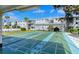 A covered shuffleboard court next to an apartment complex at 1850 Sunny Dr # F4, Bradenton, FL 34207