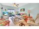 Bright living room with sliding glass doors leading to outdoor space at 2014 Canal Dr # M6, Bradenton, FL 34207