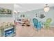 Open-concept living room with dining area and view of the kitchen at 2014 Canal Dr # M6, Bradenton, FL 34207