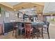 Cozy bar area with brick walls, dim lighting, and a classic pub atmosphere at 2417 Fairway Oaks Dr # 22, Palmetto, FL 34221