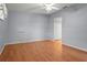 Spacious room features wood-look floors, a ceiling fan, and a closet with double doors at 2417 Fairway Oaks Dr # 22, Palmetto, FL 34221