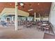 Expansive dining area with a bar, ample seating, and large windows for natural light at 2417 Fairway Oaks Dr # 22, Palmetto, FL 34221