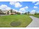 Exterior view of community golf course and building with a putting green at 2417 Fairway Oaks Dr # 22, Palmetto, FL 34221