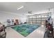 Spacious garage with a vibrant patterned rug and an automatic door at 2417 Fairway Oaks Dr # 22, Palmetto, FL 34221