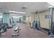 Fully equipped gym with various weight machines, free weights, and exercise equipment at 2417 Fairway Oaks Dr # 22, Palmetto, FL 34221