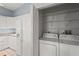 Convenient laundry area adjacent to the kitchen, with washer, dryer, and additional storage space at 2417 Fairway Oaks Dr # 22, Palmetto, FL 34221