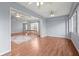 Open living area with laminate flooring, natural light, ceiling fans, and a neutral color palette at 2417 Fairway Oaks Dr # 22, Palmetto, FL 34221