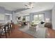 Open-concept living room featuring wood floors and a stylish layout and comfortable seating at 2417 Fairway Oaks Dr # 22, Palmetto, FL 34221