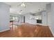 Open-concept living area boasts hardwood floors and seamless flow to the kitchen at 2417 Fairway Oaks Dr # 22, Palmetto, FL 34221