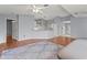 Open living area with hardwood floors, neutral walls, and transition to kitchen at 2417 Fairway Oaks Dr # 22, Palmetto, FL 34221