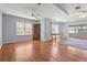 Spacious living room features hardwood flooring, neutral walls, and plenty of natural light at 2417 Fairway Oaks Dr # 22, Palmetto, FL 34221