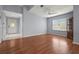 Inviting living room features hardwood floors and natural light from a bright window at 2417 Fairway Oaks Dr # 22, Palmetto, FL 34221