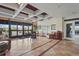 Spacious lobby with tiled floors, seating, and views of the exterior through glass doors at 2417 Fairway Oaks Dr # 22, Palmetto, FL 34221