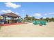 Outdoor bar with seating, views of the pool and golf course, perfect for entertaining at 2417 Fairway Oaks Dr # 22, Palmetto, FL 34221