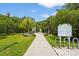 Landscaped walking path offers a beautiful view for outdoor recreation and relaxation at 2417 Fairway Oaks Dr # 22, Palmetto, FL 34221