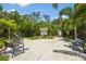 Picturesque walkway framed by mature trees and lush greenery, offering a tranquil outdoor escape at 2417 Fairway Oaks Dr # 22, Palmetto, FL 34221