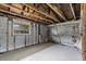 Interior space of a building showcasing concrete block walls and wooden framing at 268 Alsace Ave, Venice, FL 34293