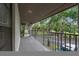 A view from the balcony overlooks the neighborhood at 3003 Quail Holw # 10, Sarasota, FL 34235