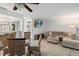 Open living space with dining area, comfortable seating, and modern amenities at 3003 Quail Holw # 10, Sarasota, FL 34235