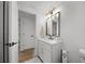 Well-lit bathroom featuring contemporary fixtures and ample space at 326 Randolph Rd, Venice, FL 34293