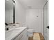 Modern bathroom with a sleek vanity, toilet, and minimalist shower at 326 Randolph Rd, Venice, FL 34293