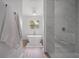 Luxurious bathroom with tub and shower, offering a spa-like experience at 326 Randolph Rd, Venice, FL 34293