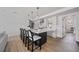 Open-concept kitchen with an island, seating, and sleek countertops, perfect for entertaining at 326 Randolph Rd, Venice, FL 34293