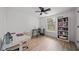 Inviting office features multiple desks and a bookcase, great for productivity at 326 Randolph Rd, Venice, FL 34293