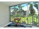 Balcony view of building and well-maintained greenery at 3985 Maceachen Blvd # 224, Sarasota, FL 34233