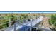 A picturesque boardwalk leading to Siesta Beach, surrounded by native vegetation and scenic views at 3985 Maceachen Blvd # 224, Sarasota, FL 34233