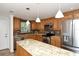 Updated kitchen featuring granite countertops, stainless steel appliances, and ample cabinet space at 3985 Maceachen Blvd # 224, Sarasota, FL 34233